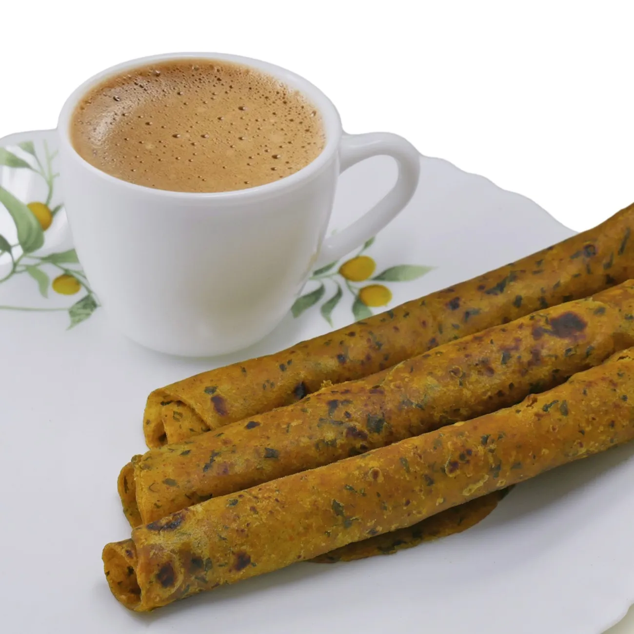 Methi thepla rolls served alongside a cup of masala chai